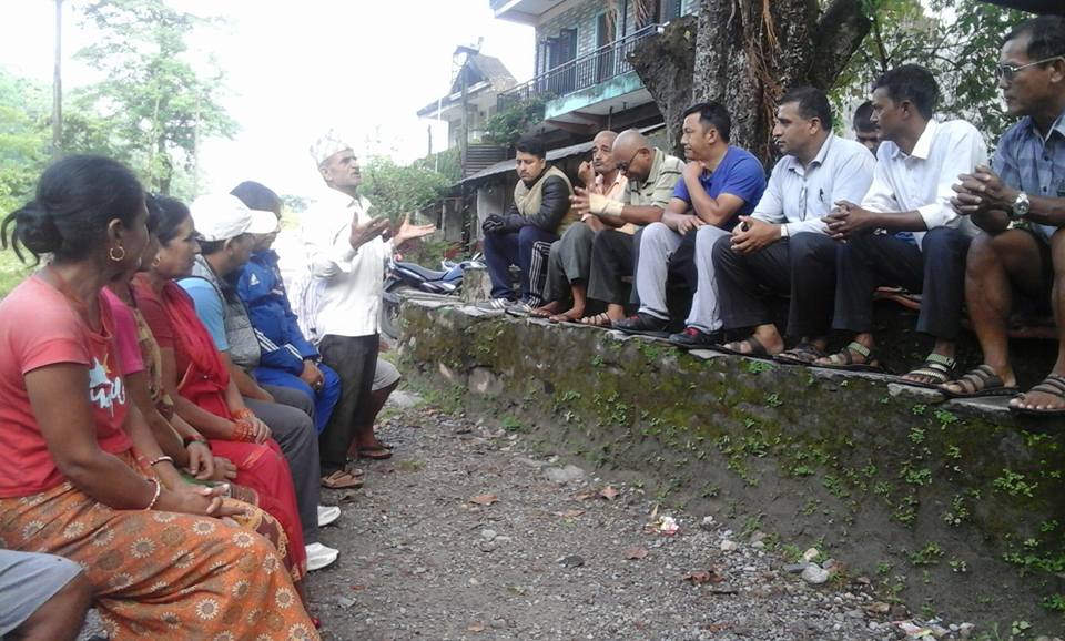 An informal meeting to save the Dobilla bridge and settlement. Picture: Keshab Thapa/FB