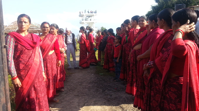 Women group ready to welcome their guests of press meet in Pumdikot on Saturday. Picture: Recentfusion.com